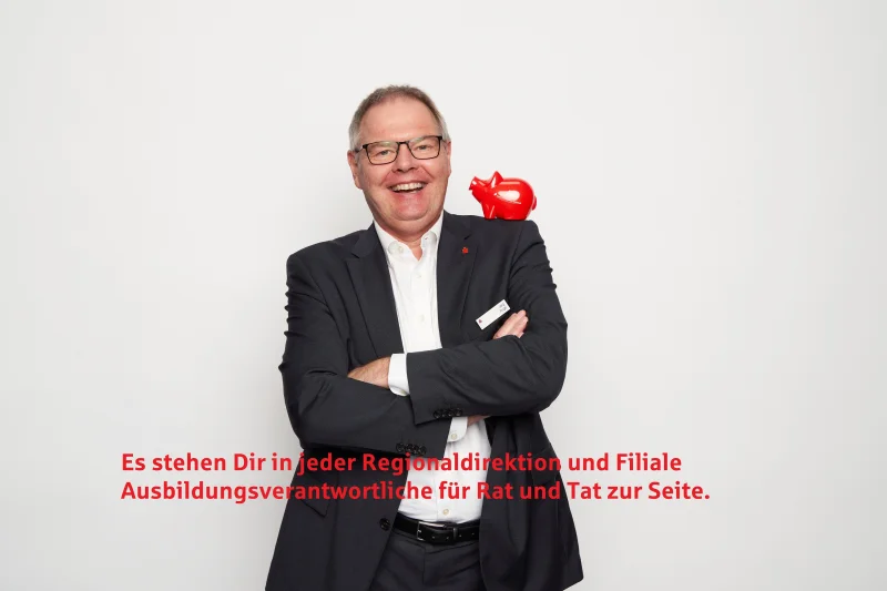 Mitarbeiter der Nospa mit Sparschwein